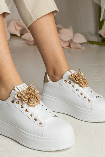 Wit-gouden sneakers met... 2