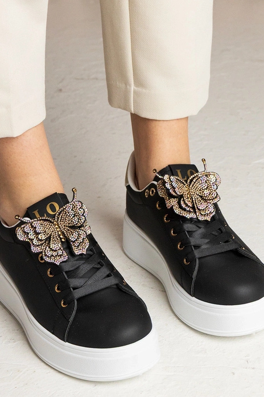 Zwarte sneakers met vlinder en... Zwarte sneakers met vlinder en...