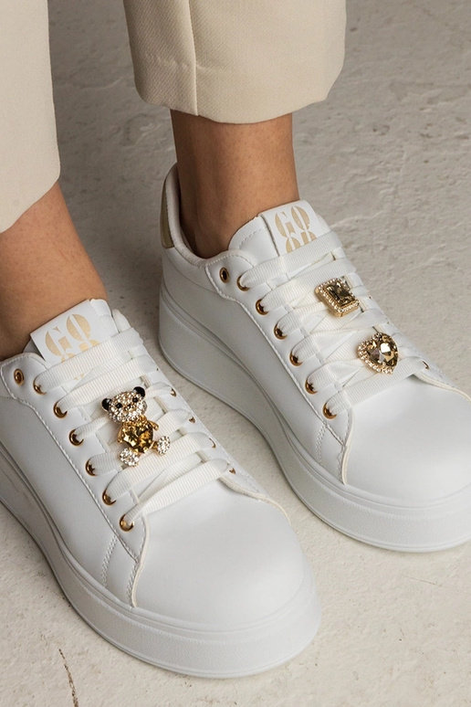 Zwart-gouden dames sneakers versierd...