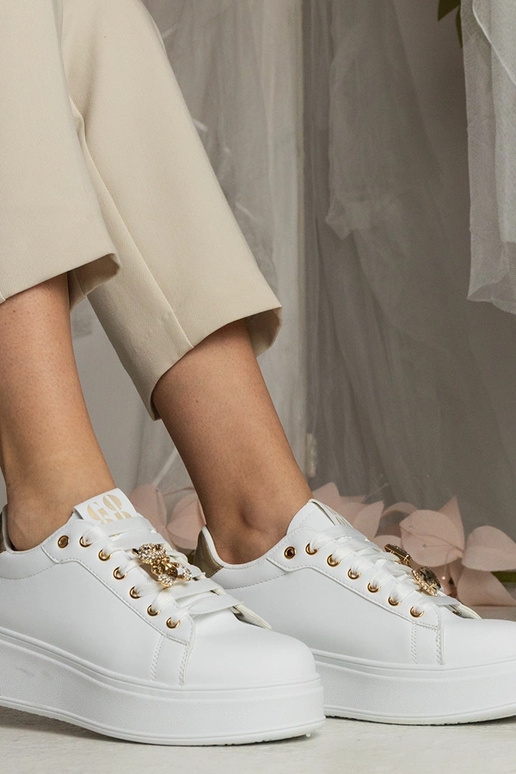 Zwart-gouden dames sneakers versierd...