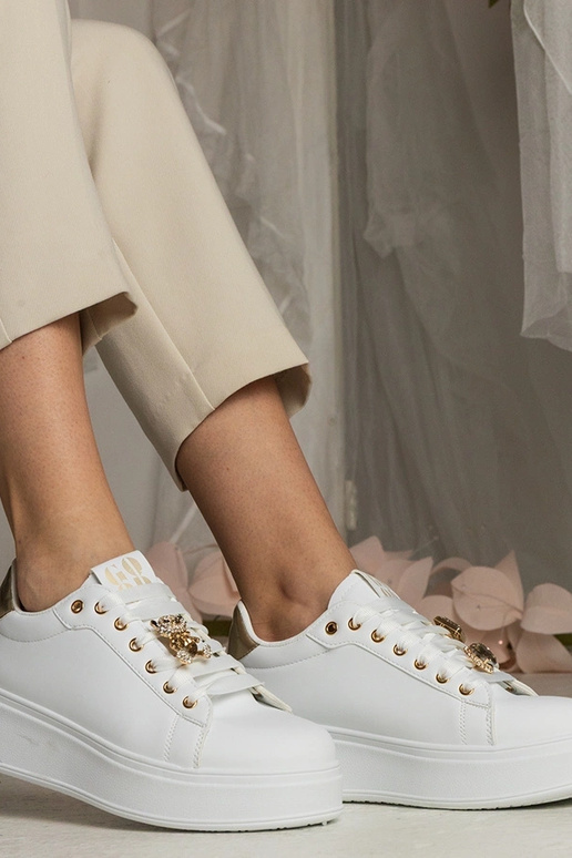 Zwart-gouden dames sneakers versierd...