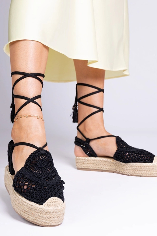 Zwarte gevlochten dames espadrilles... Zwarte gevlochten dames espadrilles...