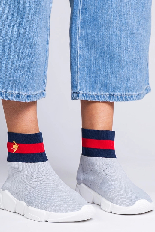 Grijze dames sneakers met een... Grijze dames sneakers met een...