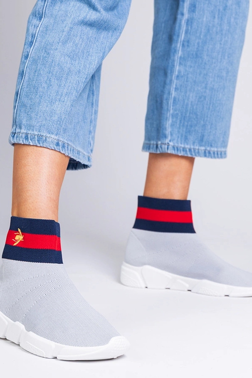 Grijze dames sneakers met een... Grijze dames sneakers met een...