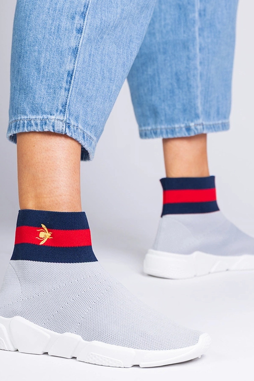 Grijze dames sneakers met een... Grijze dames sneakers met een...