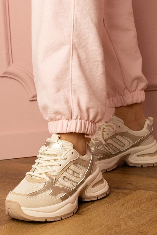 Zandkleurige dames sneakers op dikke...