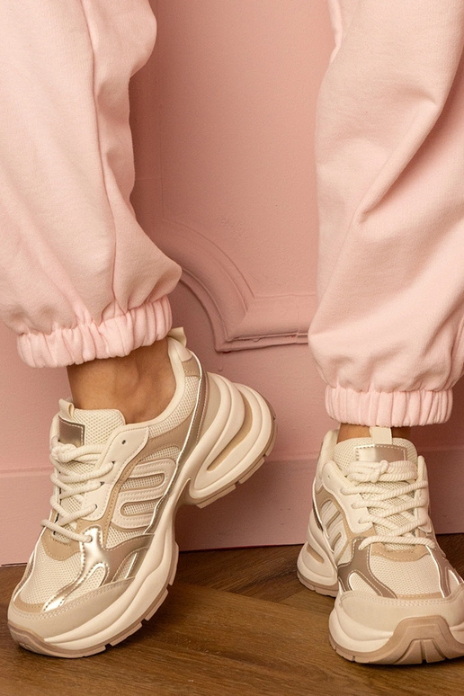 Zandkleurige dames sneakers op dikke...