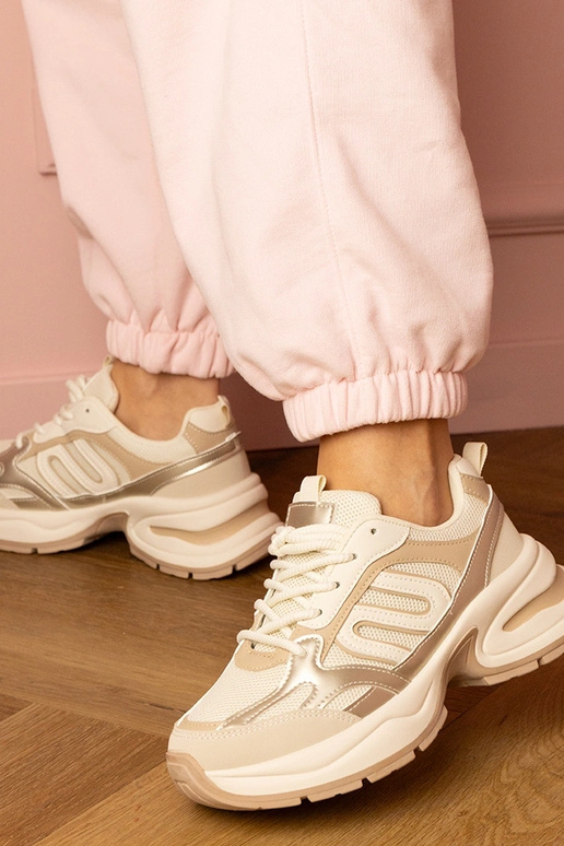 Zandkleurige dames sneakers op dikke...