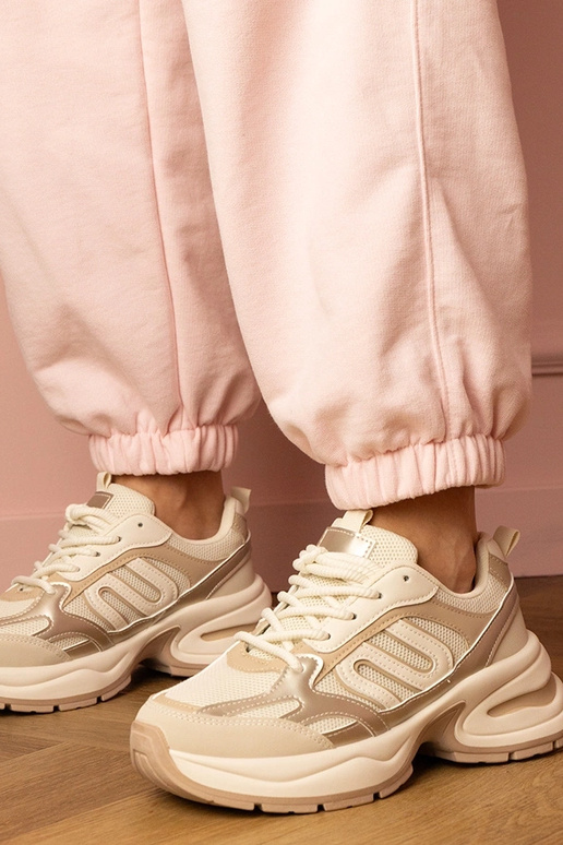 Zandkleurige dames sneakers op dikke...