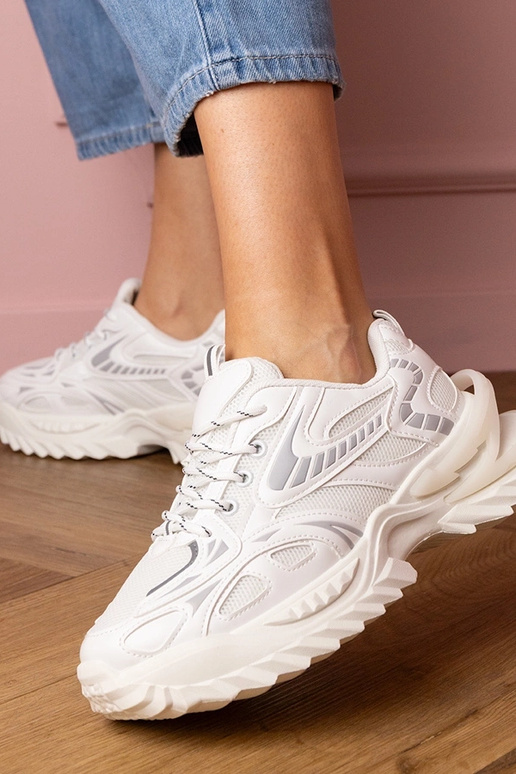Witte dames sneakers op stijlvolle... Witte dames sneakers op stijlvolle...