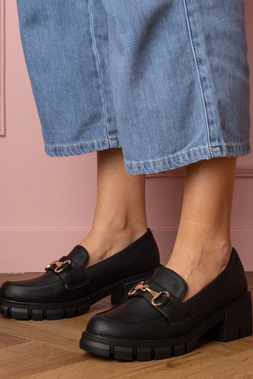 Zwarte dames enkellaarsjes op een...