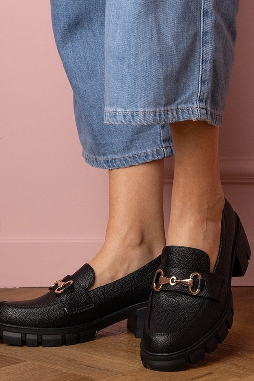 Zwarte dames enkellaarsjes op een...