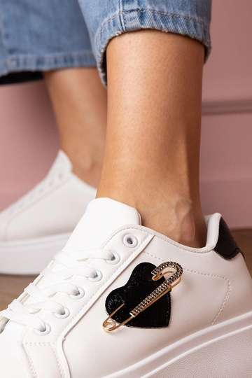 Witte dames sneakers met...