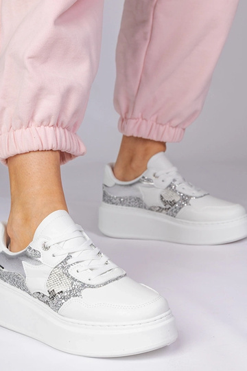 Witte sportschoenen met...