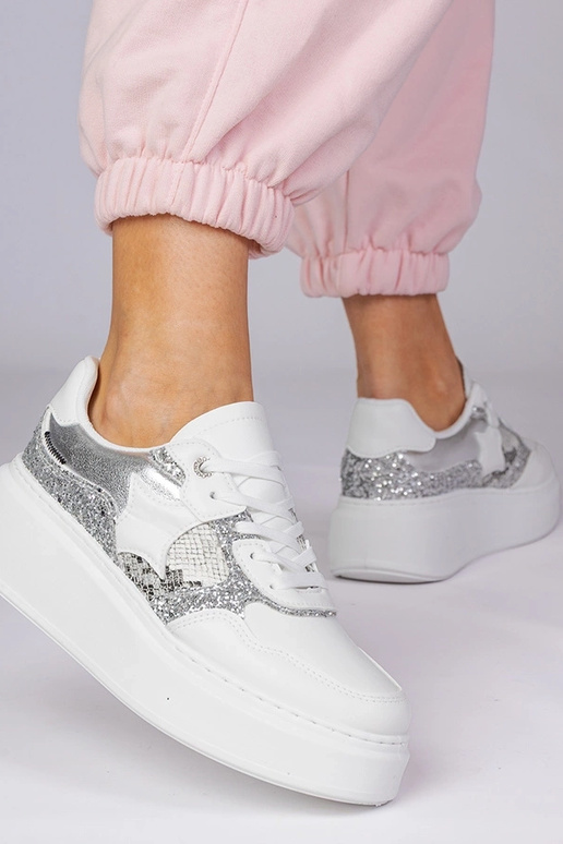 Witte sportschoenen met glitter en...