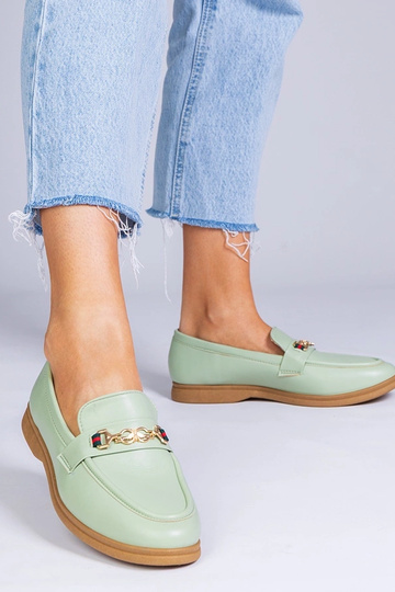 Groene mocassins met gouden...