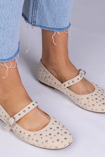 Zandkleurige ballerina's...
