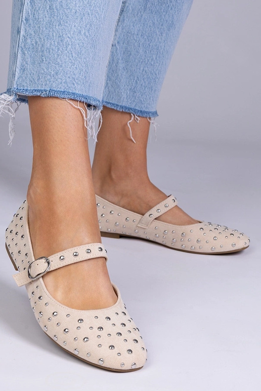 Zandkleurige ballerina's met studs en...