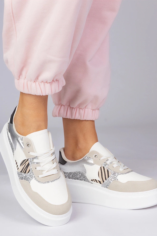 Zandkleurige sneakers met glitters en...