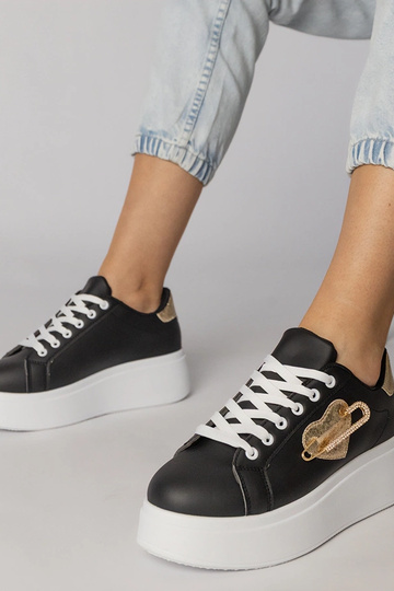Zwarte sneakers met een...