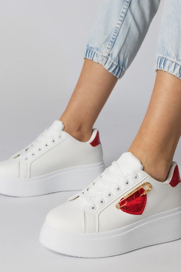 Witte sneakers met een rode... 2