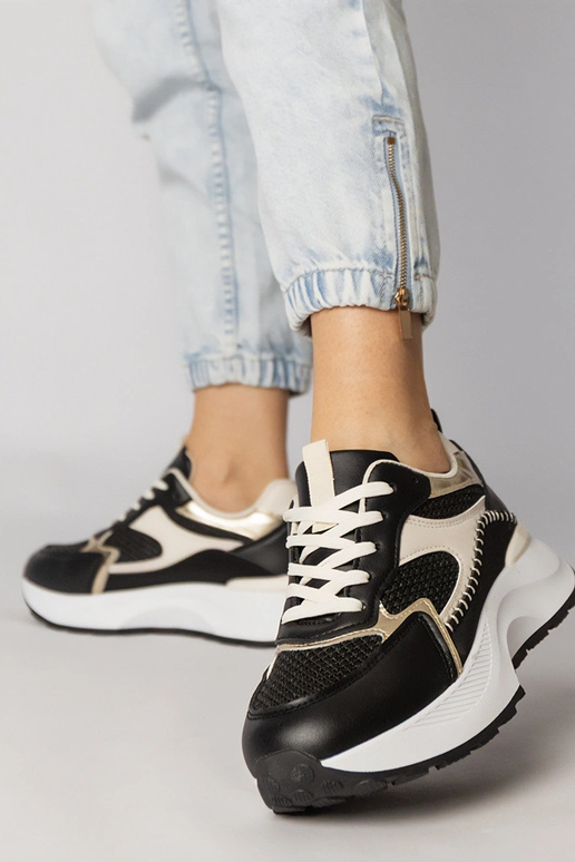 Zwarte sportschoenen met gevlochten...