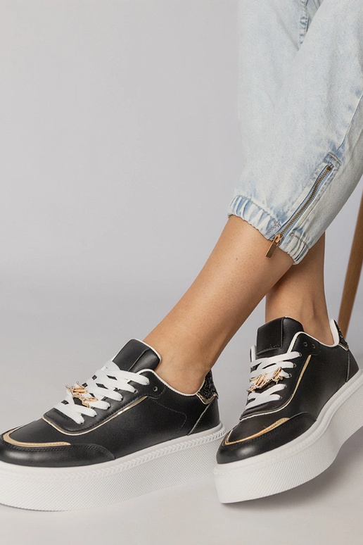 Zwarte sportschoenen met glitters en...