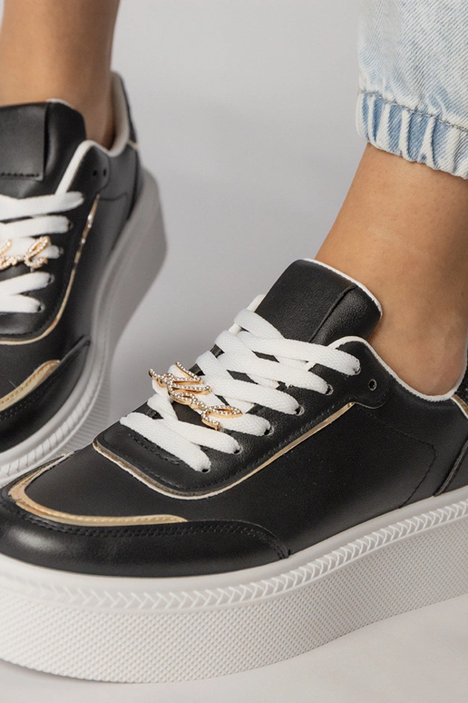 Zwarte sportschoenen met glitters en...