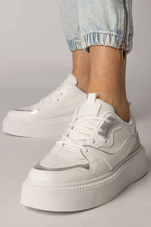 Witte sportschoenen met stoffen...