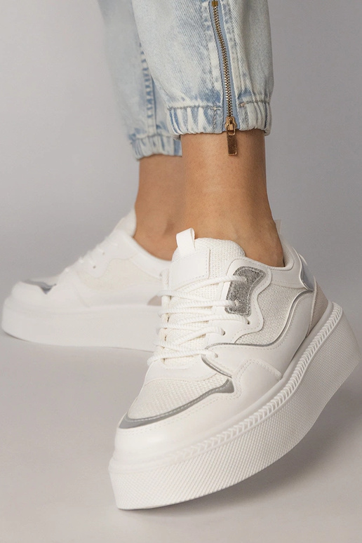 Witte sportschoenen met stoffen...