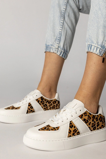 Witte dames sportschoenen met panterprint, „Toris"