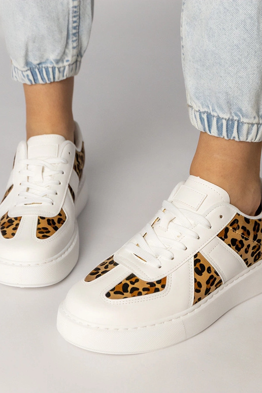 Witte dames sportschoenen met...