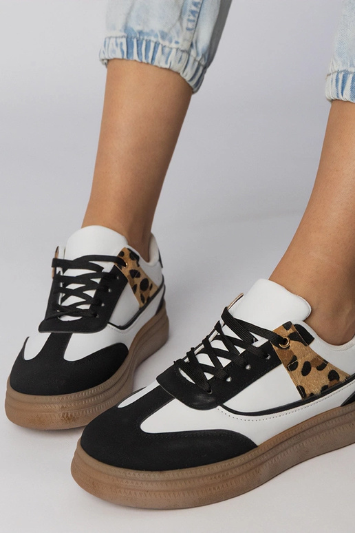 Wit-zwart sportschoenen met...