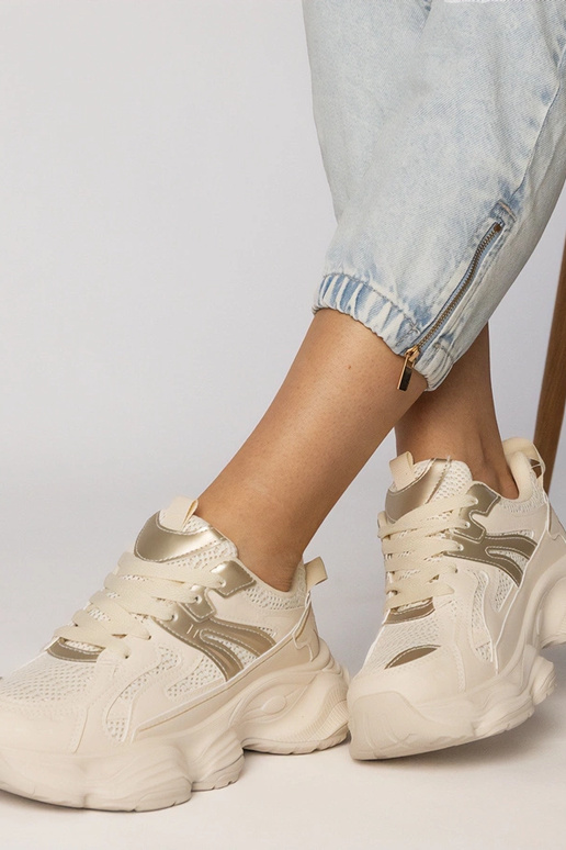 Zandkleurige dames sportschoenen met...