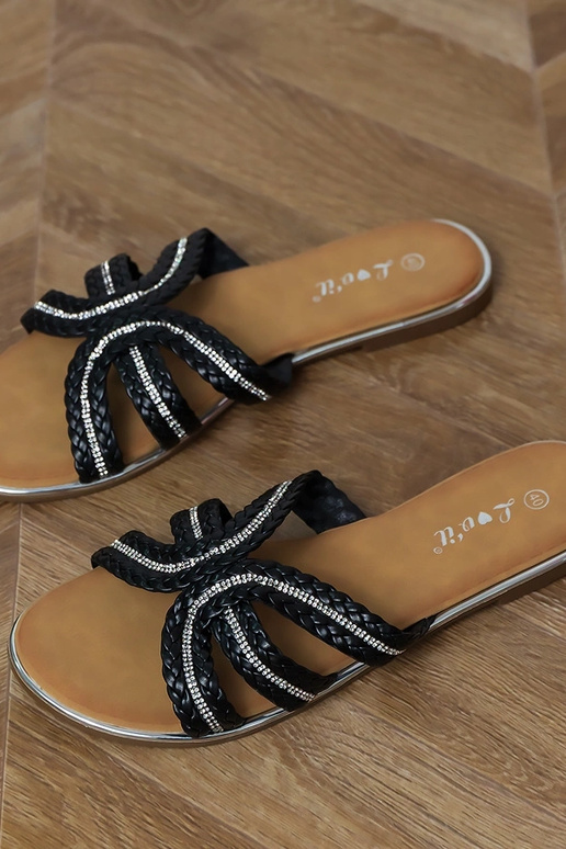 Zwarte platte slippers met vlecht... Zwarte platte slippers met vlecht...