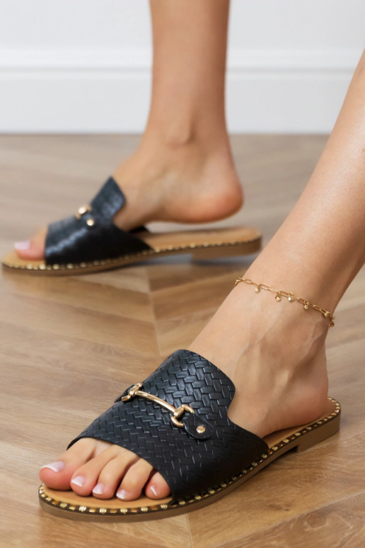 Zwarte platte slippers met brede band... Zwarte platte slippers met brede band...