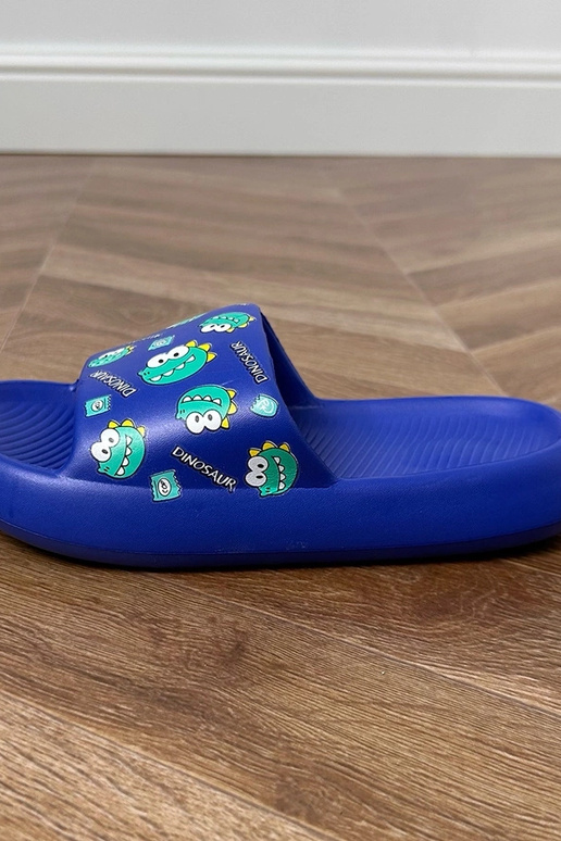 Blauwe kinder slippers met prints Dinos Blauwe kinder slippers met prints Dinos