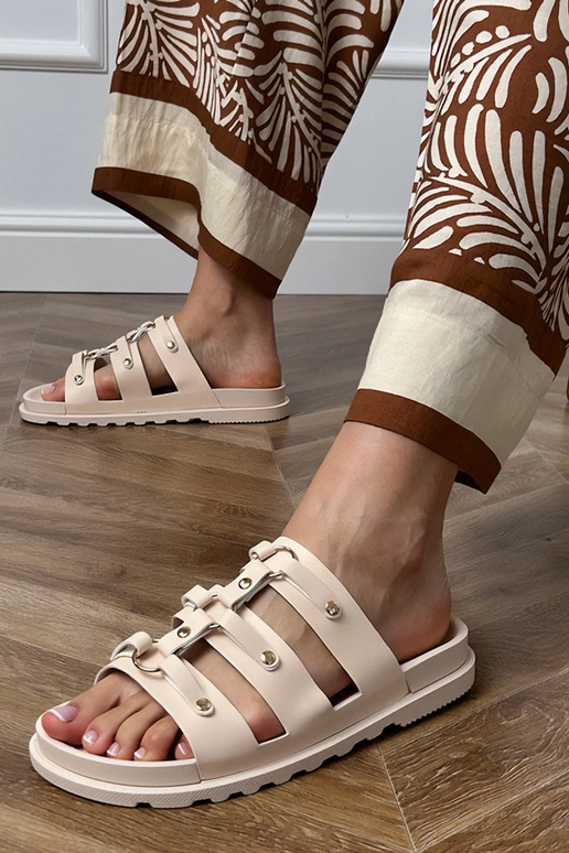 Zandkleurige Romeinse slippers met... Zandkleurige Romeinse slippers met...