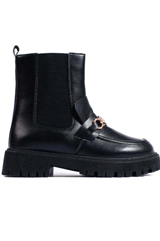 Dameslaarzen met plateau in een... Dameslaarzen met plateau in een...