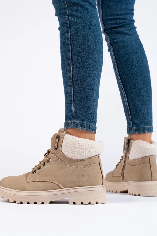 Zandkleurige enkellaarzen van... Zandkleurige enkellaarzen van...