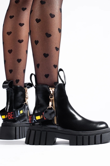 zwarte laarzen met een... 2