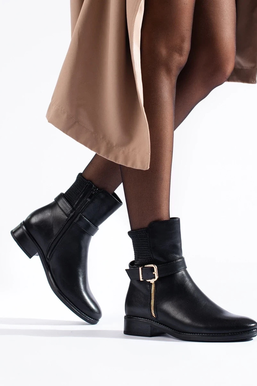 Zwarte dameslaarzen tot over de enkel Zwarte dameslaarzen tot over de enkel