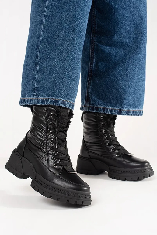 Zwarte snowboots met platform.