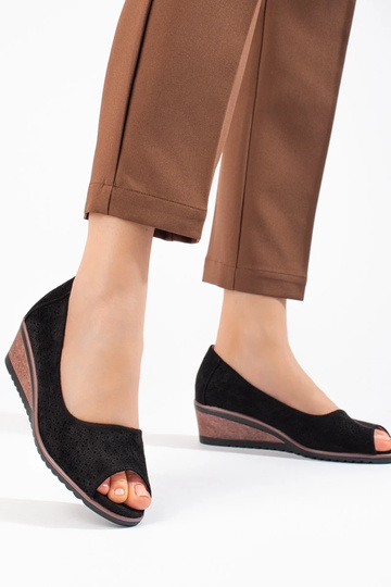 met opengewerkte elementen... 2