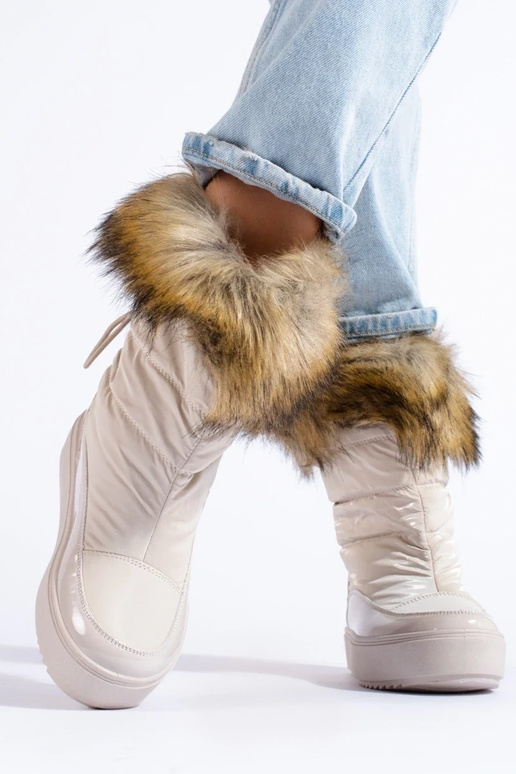 Crèmekleurige damessnowboots met bont Crèmekleurige damessnowboots met bont