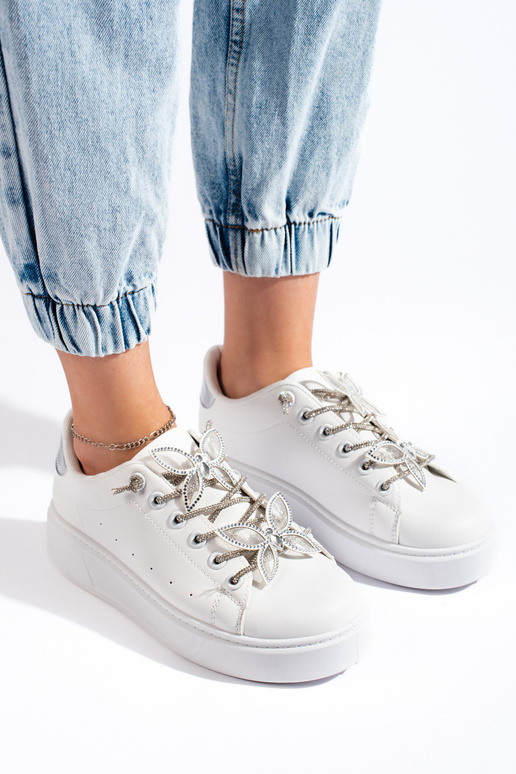 Witte sneakers met vlinders