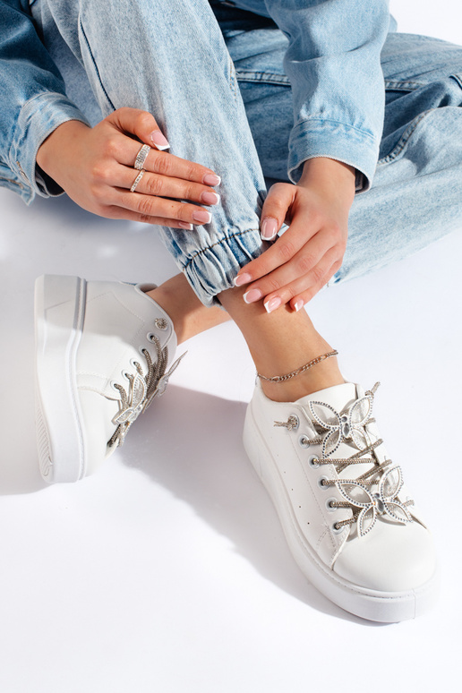 Witte sneakers met vlinders