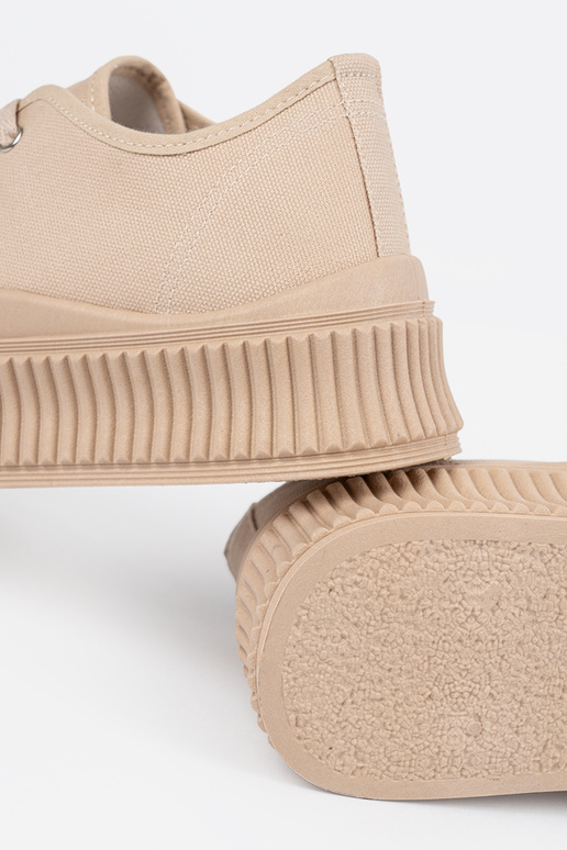 Zandkleurige dames schoenen met... Zandkleurige dames schoenen met...