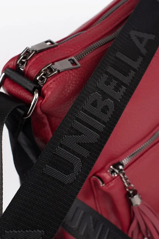 rode damestastype rugzak met kwastjes