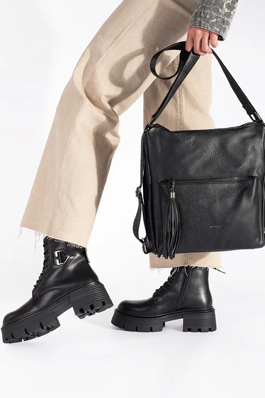 zwarte damestastype rugzak met kwastjes